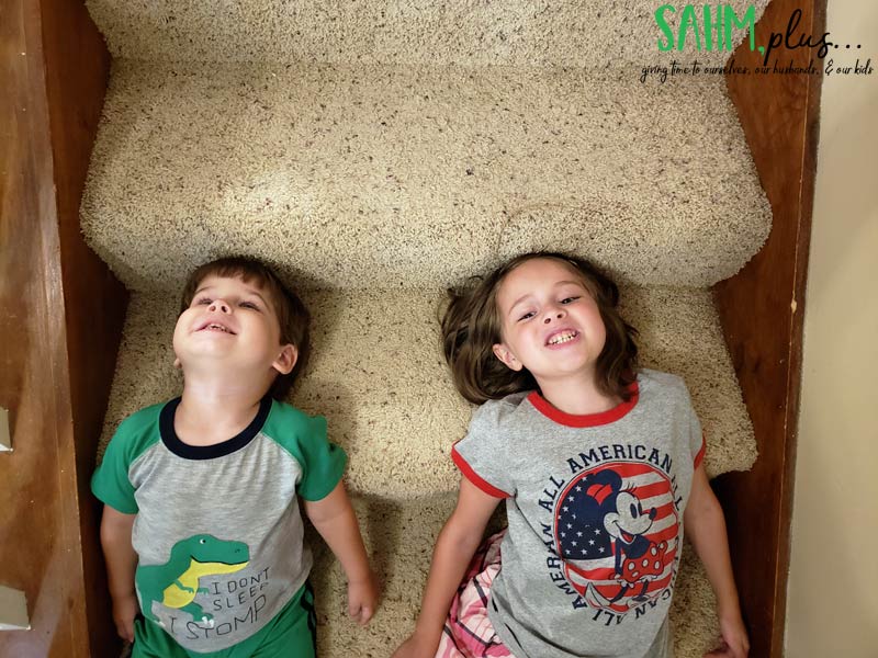 Our kids happily playing on stairs | sahmplus.com