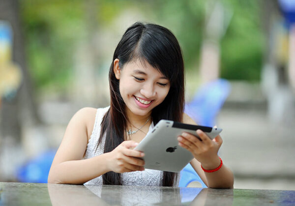 Teen with Ipad; parenting in the age of digital technology